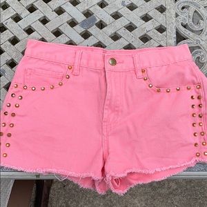 Coral-pink, gold studded jean shorts